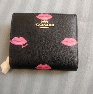 Coach black snap wallet lip print